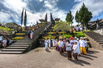 Worshippers gathering at the sacred temple of Pura Penetaran Agung Besakih