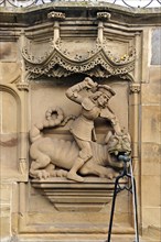 High-relief of St. George and the Dragon as a well figure on the Gothic Fischbrunnen fountain