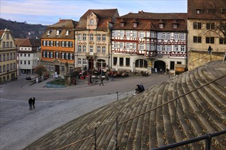 View from the flight of stairs in front of Saint Michael towards the old building facades on Marktplatz square