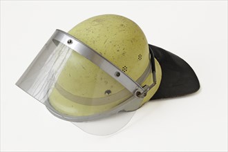Fireman's helmet with a protective face shield