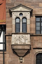 Bay window with a relief of the Fall of Man