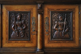 Wood carved reliefs in a cabinet from about 1535