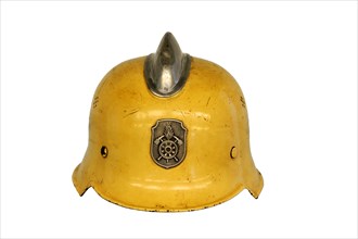 Metal firefighter's helmet with a fire department emblem and a coat of arms