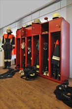 Opened firefighter's lockers during a fire alarm