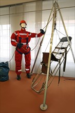 High-angle rescue suit with equipment from the fire department