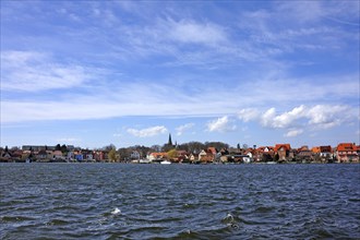 Townscape of the island town of Malchow and Malchow Lake