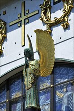 Archangel and cross above the main portal of the Church of St. Leopold at Steinhof Psychiatric Hospital