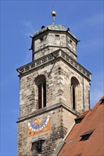 Tower of the Catholic Parish Church of St. George with sundial