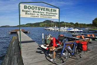 Cyclist at Obertrumer See lake