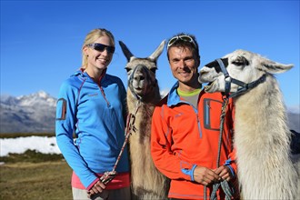 Tourist during a llama tour to the summit of Boeses Weibele Mountain in the Defregger Group