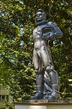 Sculpture of a pilot in front of the villa of a former commander