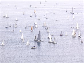 Sailing boats taking part in a historical sailing regatta