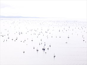 Sailing boats taking part in a historical sailing regatta