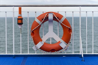 Lifebuoy on the railing on the Norrona ferry