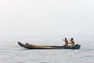 Two fishermen in their boats