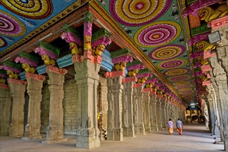 Colourful painted ceiling on stone pillars