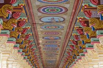 Colourfully painted pillars and ceiling