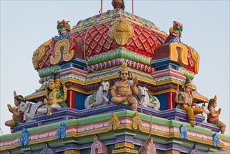 Figures of gods on a Gopuram or gate of a Hindu temple
