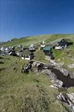 Village with houses mostly in the traditional Faroese style