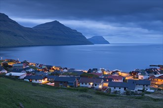 Bay and houses in the blue hour