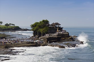 Tanah Lot Temple on a rock in the sea