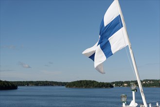 Flag of Finland on a skerry