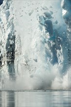 Tons of ice calving off Surprise Glacier