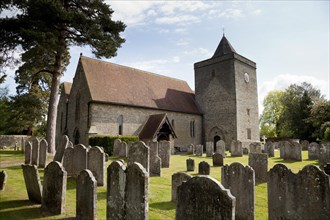 The village church and churchyard of St James