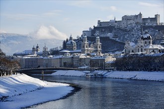 Historic architecture of Salzburg with Festung Hohensalzburg Fortress in winter