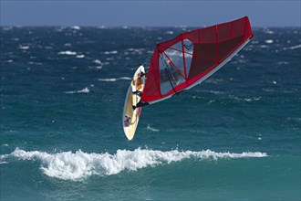 Wind surfer performing a loop