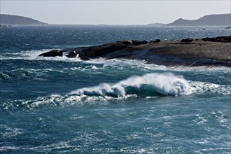Waves breaking onto rocks