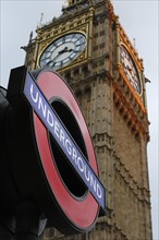 Sign of Westminster Underground Station in front of Elizabeth Tower or Big Ben
