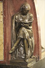 Bronze statue of a female student