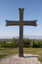 Metal cross outside Bagrati Cathedral