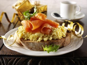 Bagel with scrambled eggs and smoked salmon