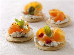 Smoked salmon and cream cheese on blinis or blini