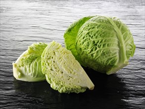 Whole and cut Savoy cabbage