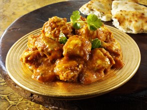 Chicken Madras with Pilau rice and Naan bread