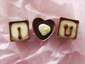 Chocolates forming the words 'I love U'