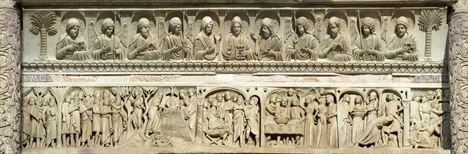 Medieval sculptural reliefs on the door of the Baptistry of St. John