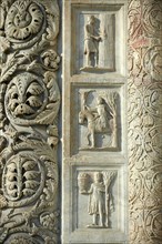 Medieval sculptural reliefs on the door of the Baptistry of St. John