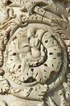 Medieval sculptural reliefs on the door of the Baptistry of St. John