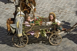 Children in an impoverished cart