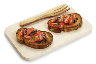 Bruschetta with tomatoes and black olives