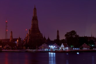 Wat Arun or 'Temple of Dawn' on the Chao Phraya River at dawn