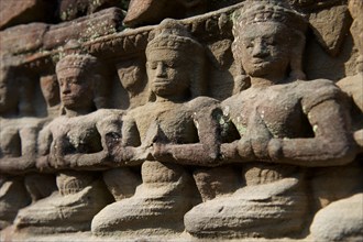 Stone figures on the Buddhist temple of Ta Som