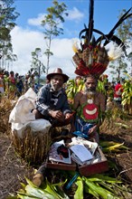 Members of a tribe in colourfully decorated costumes at the traditional sing-sing gathering