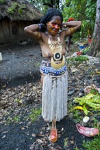 Colourfully decorated and painted woman celebrating the traditional Sing Sing in the highlands