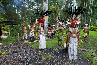 Tribe with colourful decorations and face paint is celebrating at the traditional Sing Sing gathering in the highlands