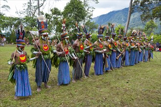 Colourfully decorated and painted tribesmen celebrating the traditional Sing Sing in the highlands